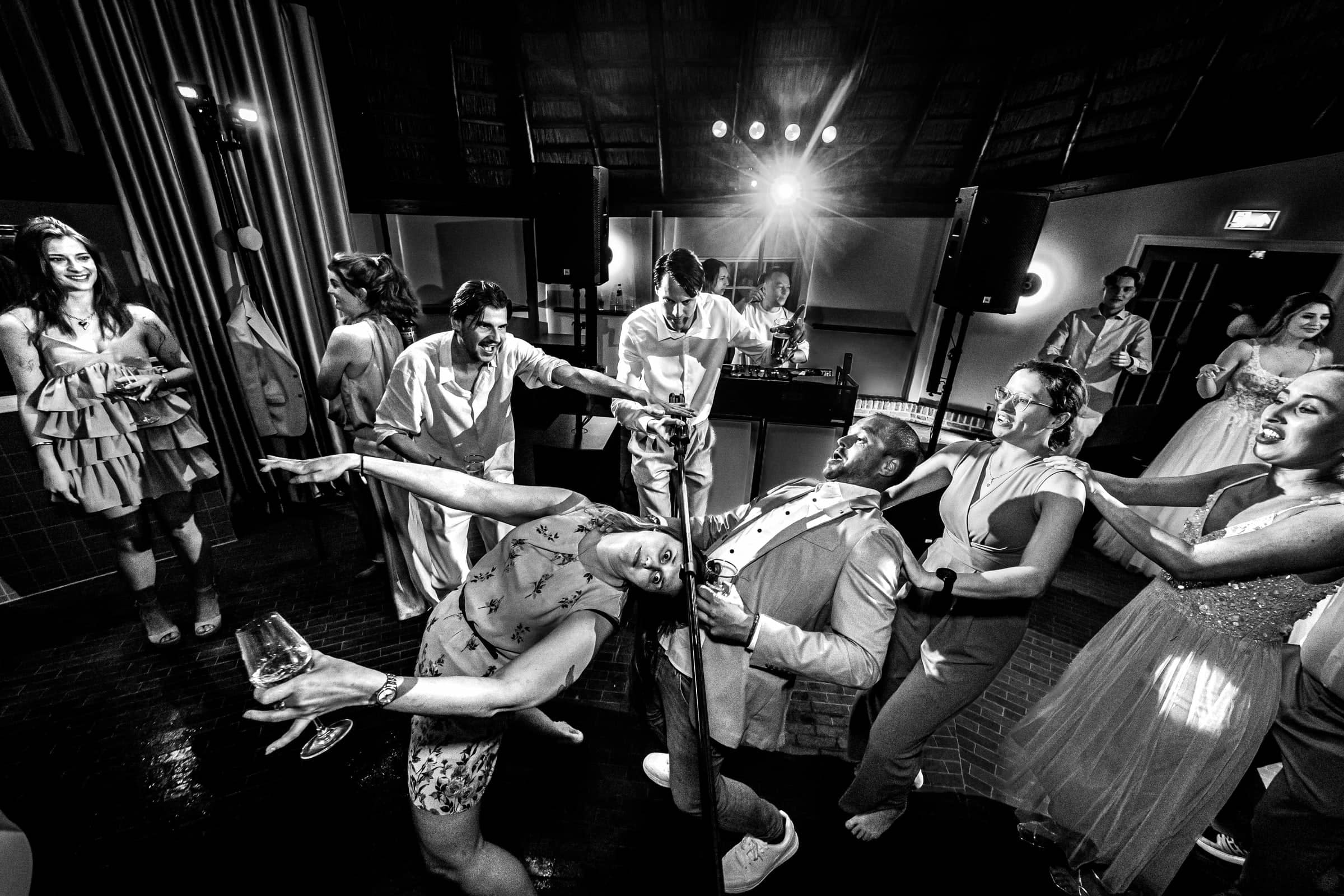 Guests let loose on the dance floor (black and white)