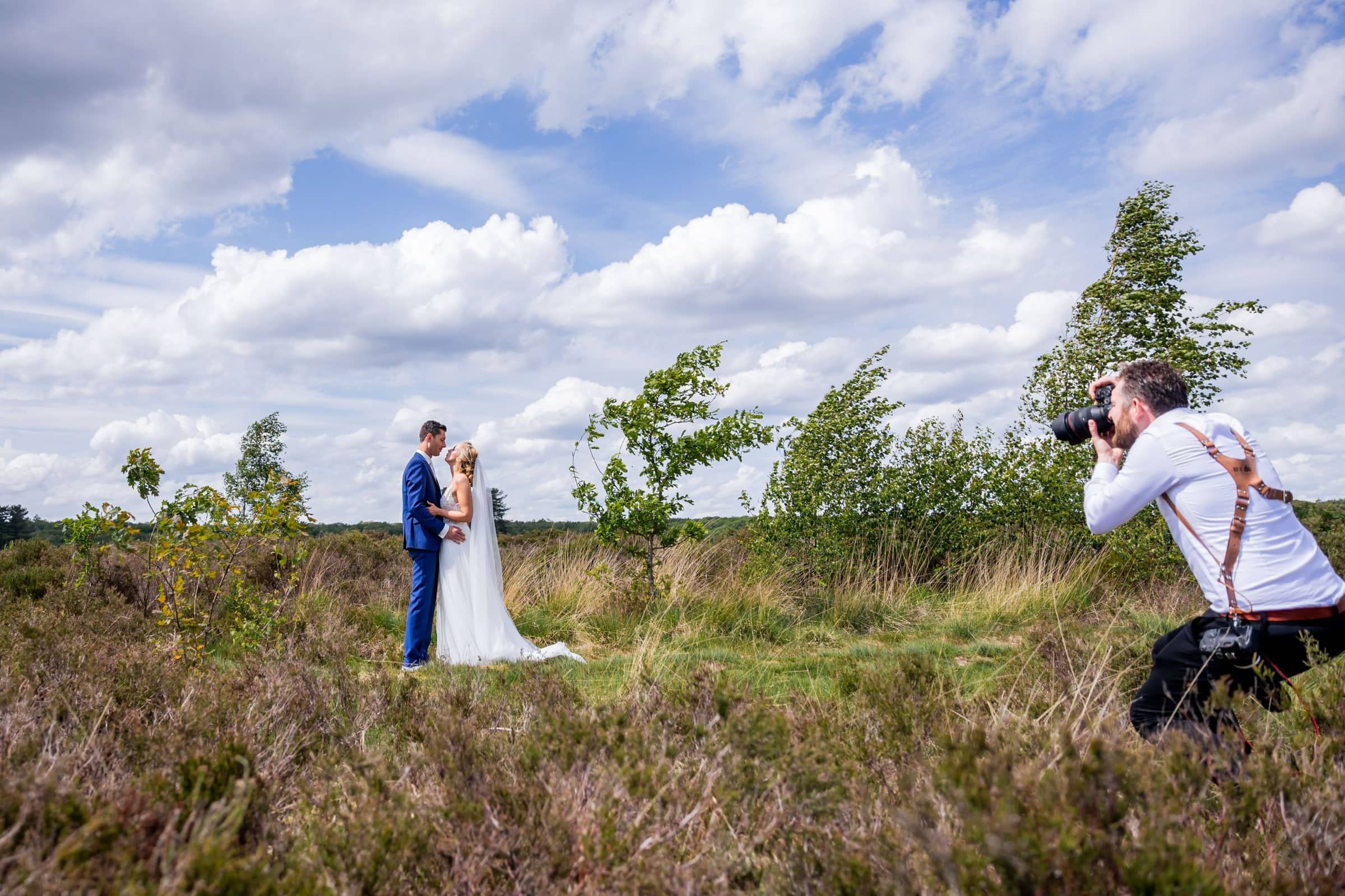 Rick de Jongh photographing a couple on the heath
