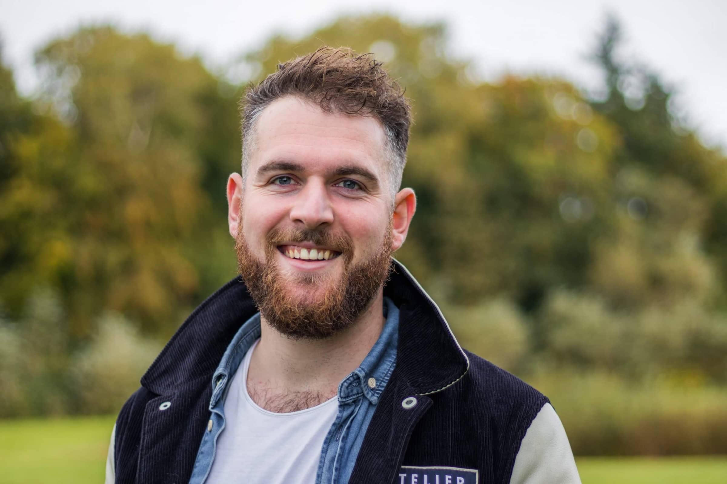 Portrait of Rick de Jongh, smiling in a park